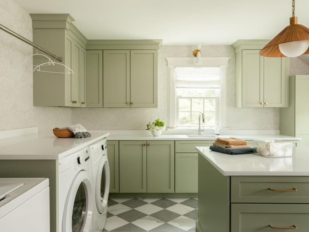 Monte Vista — laundry room with sage green cabinetry and a checkerboard tile floor